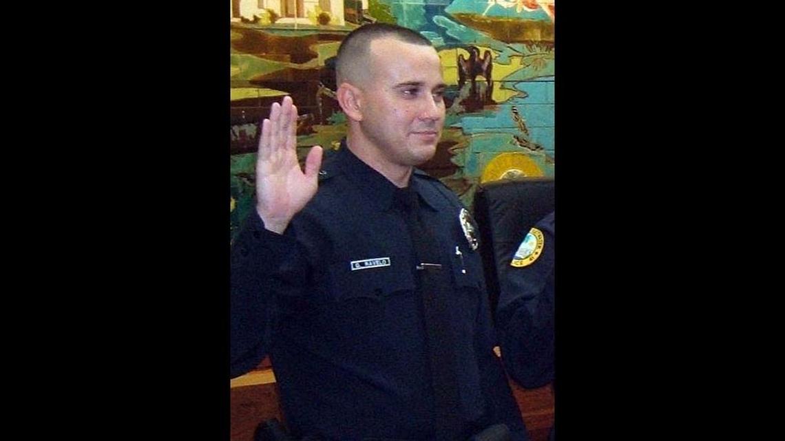 Guillermo Ravelo is sworn in as a Sweetwater reserve officer in 2009. He’s been indicted on charges of punching and beating suspects during arrests and falsifying the police reports afterward when he worked for Biscayne Park.
