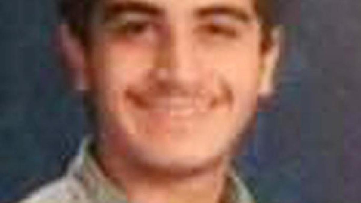Orlando shooter Omar Mateen is shown in a high school yearbook photo.