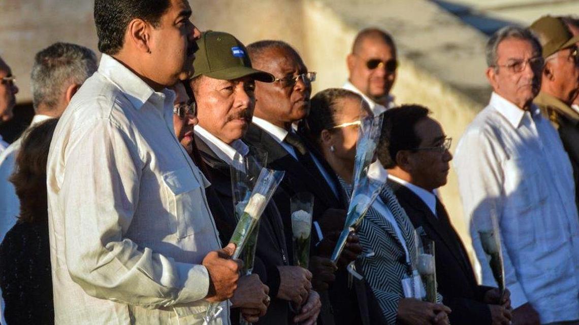 Venezuela’s President Nicolás Maduro, left, and Nicaragua’s President Daniel Ortega attend the burial ceremony of the ashes of the late Fidel Castro at the Santa Ifigenia cemetery in Santiago, Cuba, on Dec.4, 2016.
