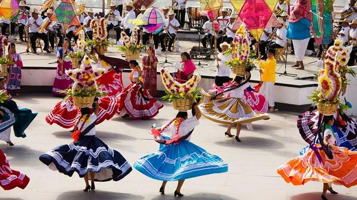 Costumed dancers at the Guelaguetza Festival in Oaxaca, Mexico.