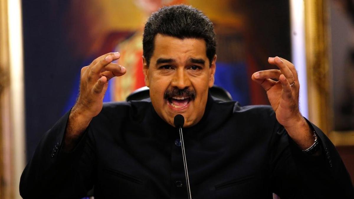 In this June 22, 2017 file photo, Venezuela's President Nicolas Maduro gives a news conference in Caracas, Venezuela. Maduro said a helicopter fired on Venezuela's Supreme Court in a confusing incident that he claimed was part of a conspiracy to destabilize his socialist government, on Tuesday, June 27, 2017.