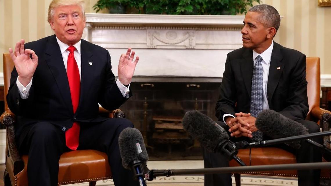President Barack Obama listens as President-elect Donald Trump speaks after their meeting in the Oval Office of the White House in Washington on Thursday, Nov. 10, 2016.