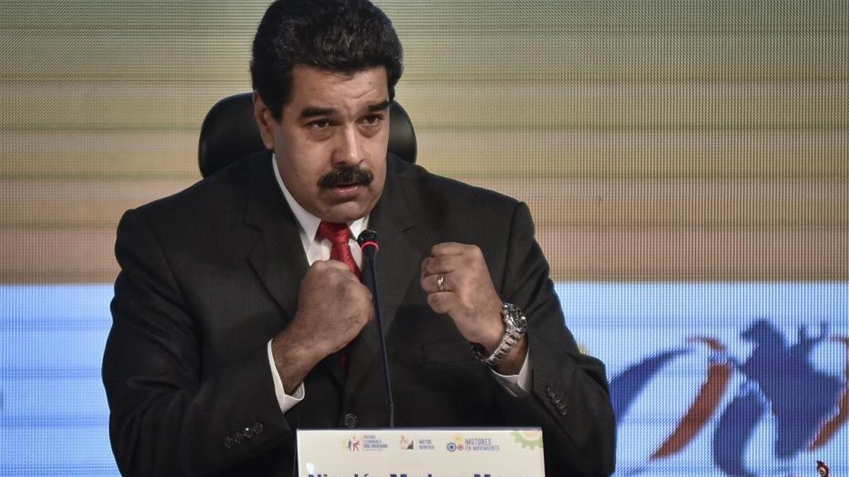 Nicolas Maduro, Venezuela's president, gestures during a meeting with representatives of international and national mining companies at the Central Bank of Venezuela headquarters in Caracas, Venezuela, on Friday, Aug. 5, 2016.