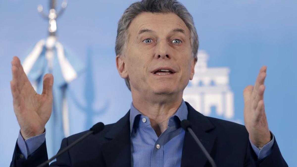 Argentine President Mauricio Macri talks about new poverty numbers released by the National Institute of Statistics and Census, INDEC, during a press conference in Buenos Aires, Argentina, Wednesday, Sept. 28.