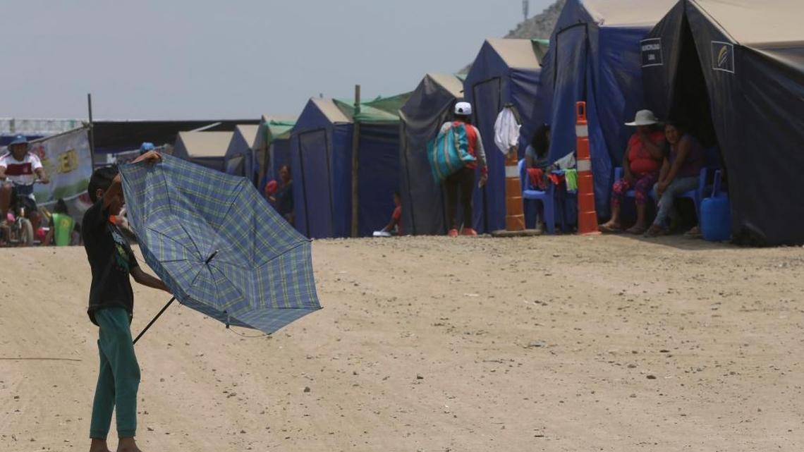 Flood survivors rest at a temporary tent camp in Lima, Peru, Tuesday, March 21, 2017. Intense rains, overflowing rivers, mudslides and flooding have hit the country, the worst seen in two decades, according to Peruvian authorities.