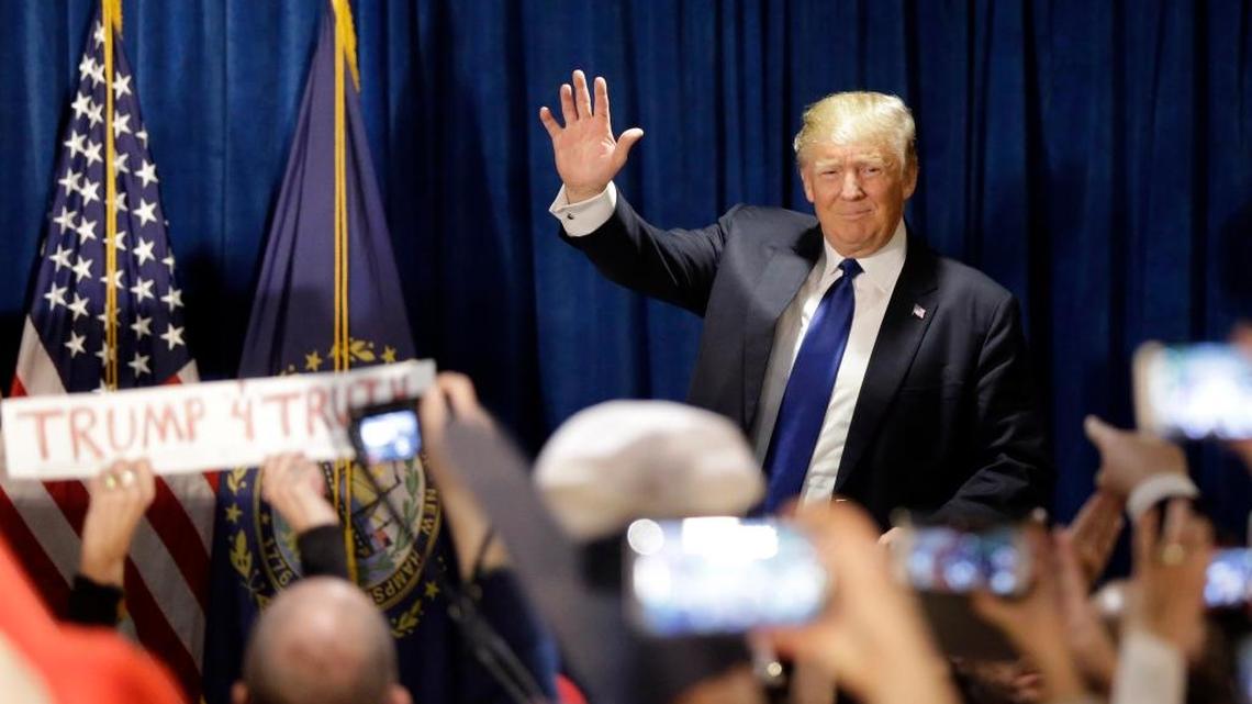 Republican presidential candidate, businessman Donald Trump takes the stage to speak to supporters during a primary night rally, Tuesday, Feb. 9, 2016, in Manchester, N.H.