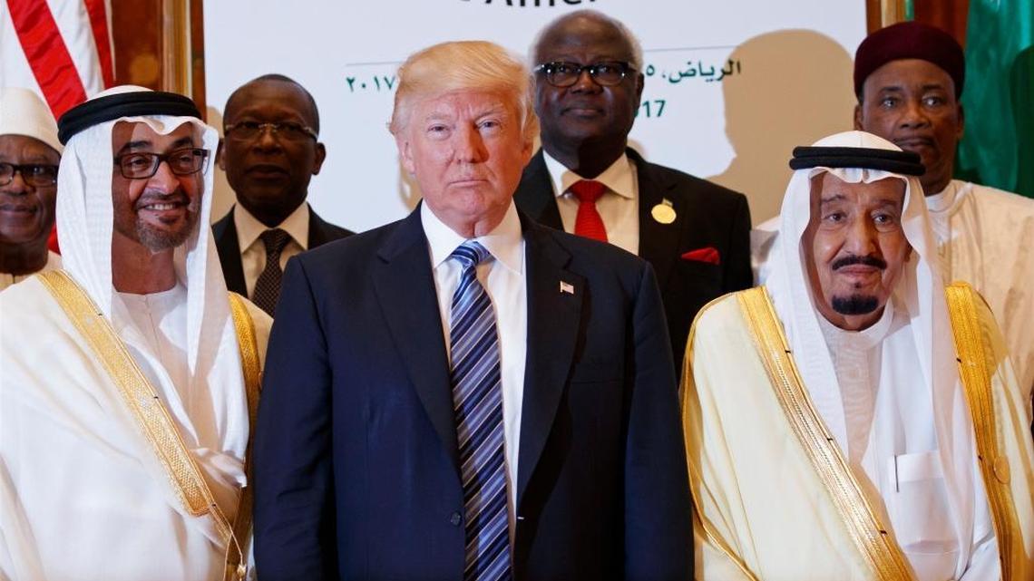 President Donald Trump poses for photos with King Salman and others at the Arab Islamic American Summit, at the King Abdulaziz Conference Center, Sunday, May 21, 2017, in Riyadh, Saudi Arabia.