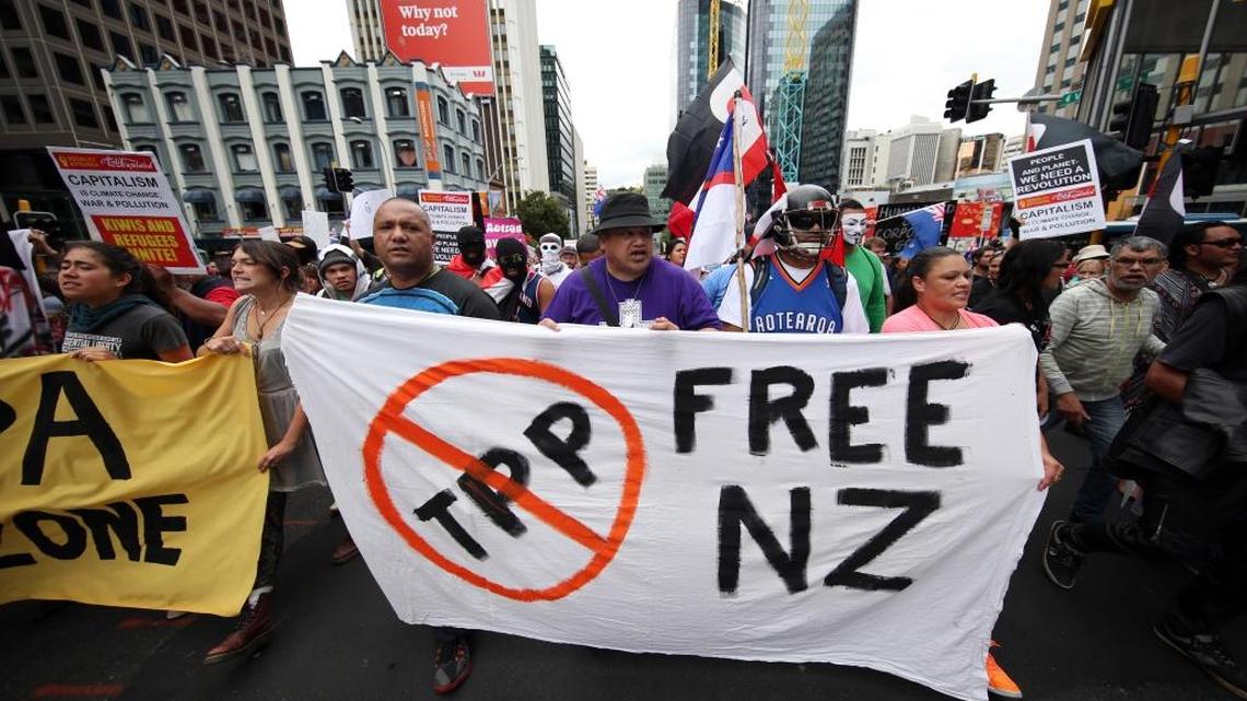 Protestors march to the venue of the Trans Pacific Partnership Agreement signing, SkyCity Conference Centre, Auckland, New Zealand, Thursday, Feb 4, 2016.