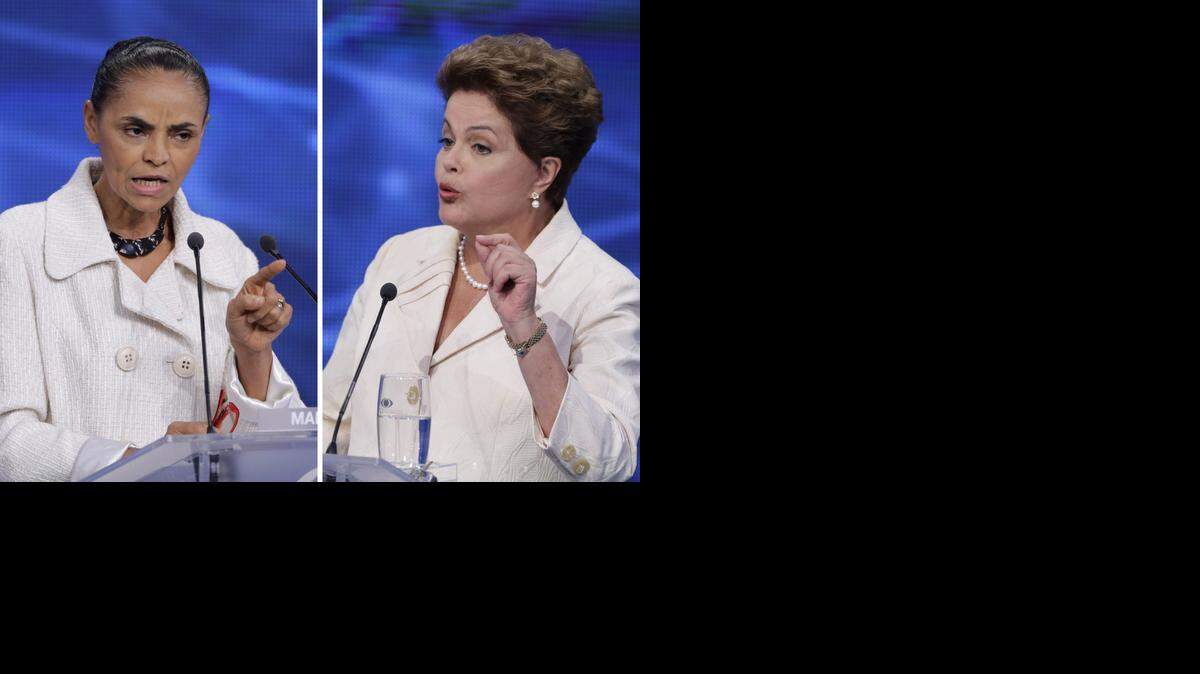 
This combination of two file pictures taken on Aug. 26, 2014, shows presidential candidate Marina Silva of the Brazilian Socialist Party, left, and Brazil's President Dilma Rousseff, who is seeking re-election, during a televised presidential debate in Sao Paulo, Brazil. More than a decade of Workers Party' rule has seen Brazil prioritize ties with its leftist regional neighbors. But if Rousseff fails to fight off the surging candidacy of reform-minded Silva before the October elections, South Americas largest economy could reset its focus.
