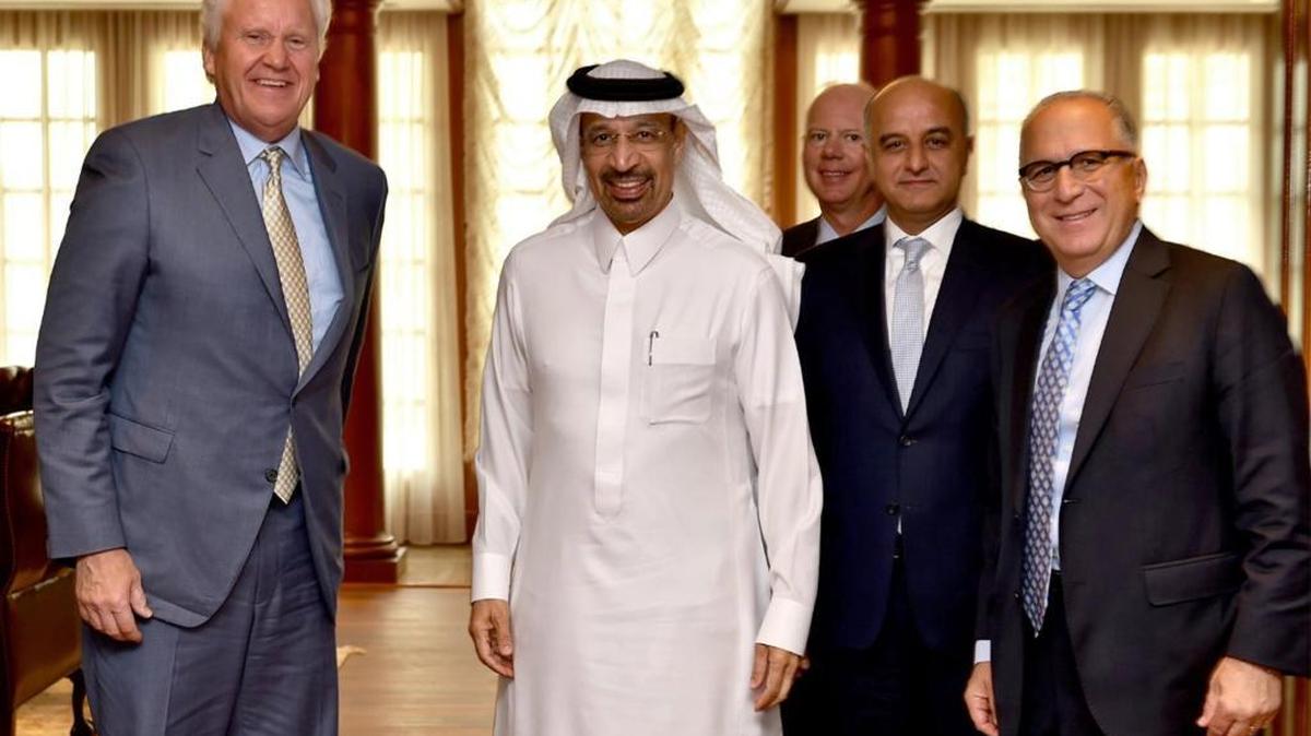 In this photo released by the Saudi Press Agency, SPA, Saudi Minister of Energy, Industry and Mineral Resources Engineer Khalid Al-Falih, second left, poses with chairman and CEO of General Electric Co. Jeffrey Immelt, left, and others after they meet in Jeddah, Saudi Arabia, on May 23, 2016.