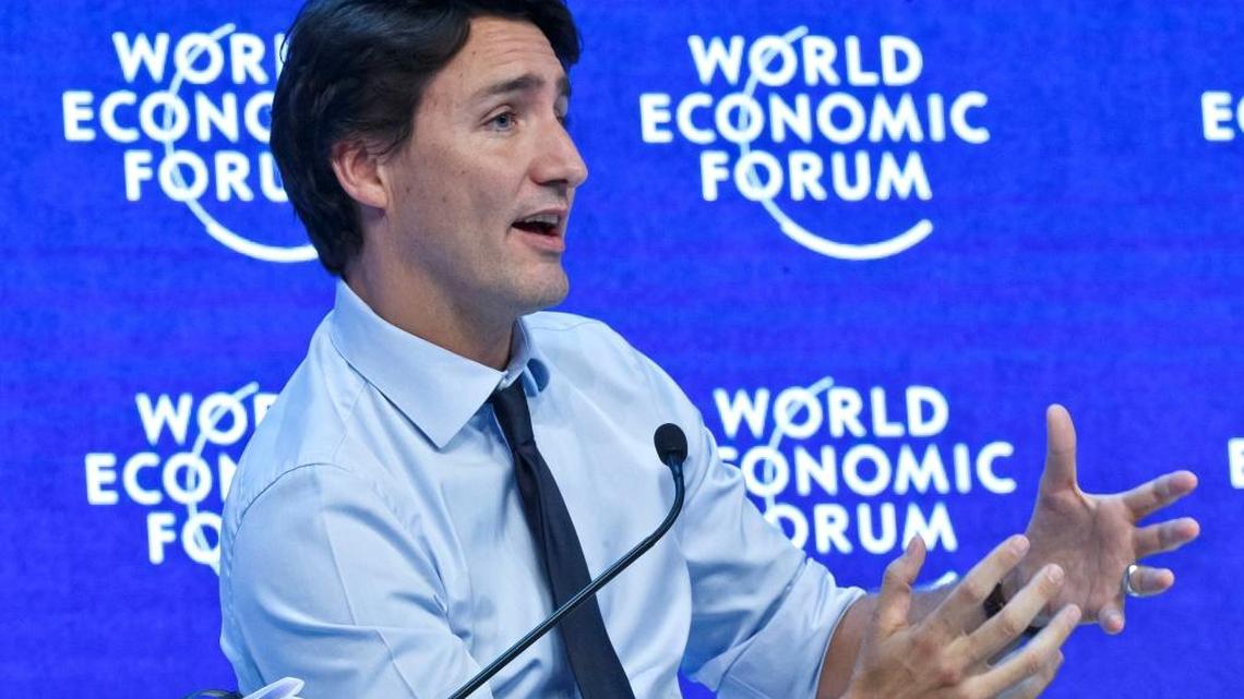 Canadian Prime Minister Justin Trudeau gestures as he speaks during a panel “Progress toward Parity” at the World Economic Forum in Davos, Switzerland, Friday, Jan. 22, 2016. A new WEF study warned that advanced robotics, artificial intelligence, self-driving cars, 3-D printers, genetics, biotechnology and other new technologies will have a bigger impact on employment than many people thought.