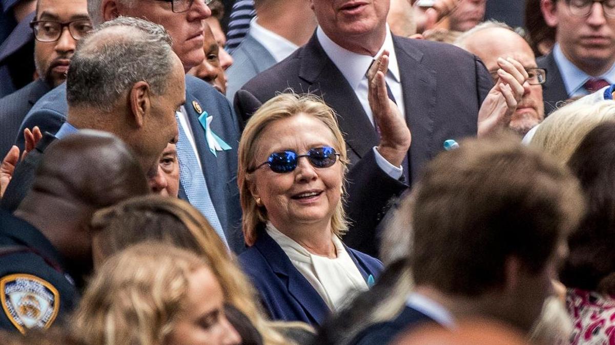This Sept. 11 photo shows Democratic presidential candidate Hillary Clinton, center, with Sen. Chuck Schumer, D-N.Y., left, Rep. Joseph Crowley, D-N.Y., second from left at top, and New York Mayor Bill de Blasio, center top, at the Sept. 11 memorial in New York. Clinton will be back on the campaign trail Thursday, after spending several days recovering from pneumonia.
