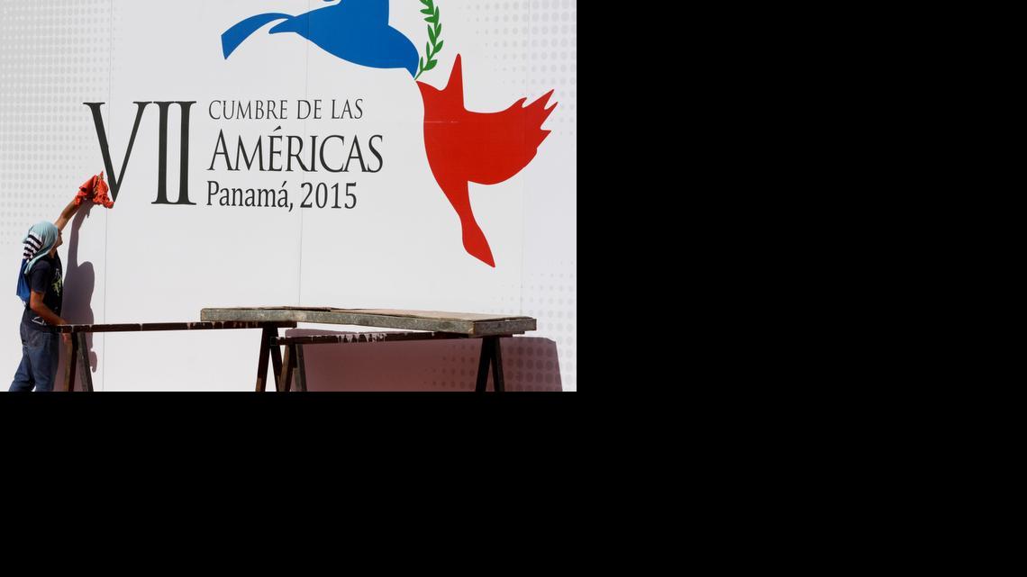 
A worker gives the finishing touches as he cleans a wall announcing the upcoming Summit of the Americas outside of the Atlapa Convention Center in Panama City. The venue will host the seventh Summit of the Americas this April 10-11, attended by Western Hemisphere leaders. 
