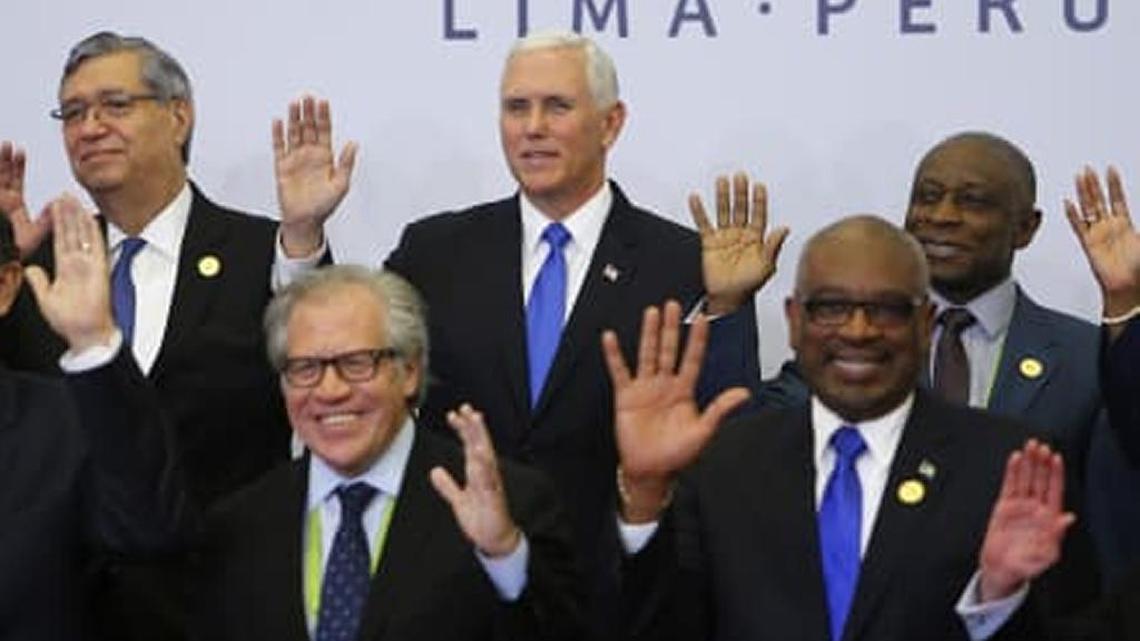 U.S. Vice President Mike Pence, center, poses with other heads of state, during the official photo of the Summit of the Americas in Lima, Peru.