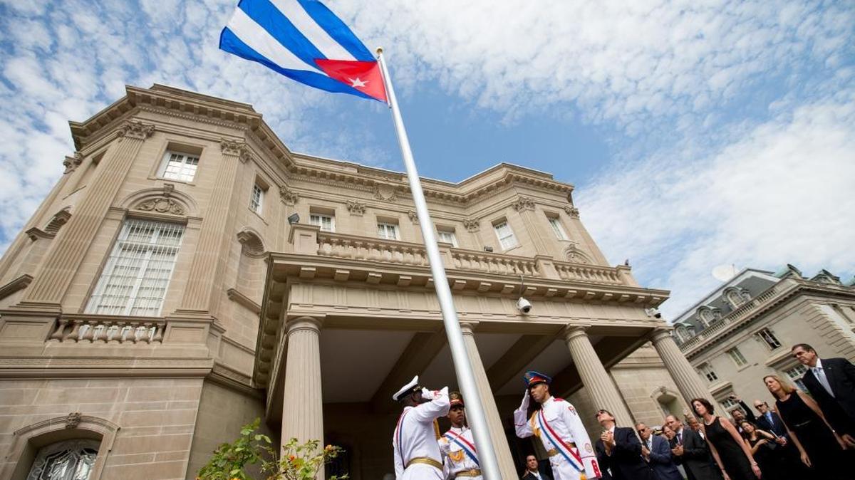 The Cuban flag is raised over the re-opened Cuban embassy in Washington, D.C. , July 20, 2015.