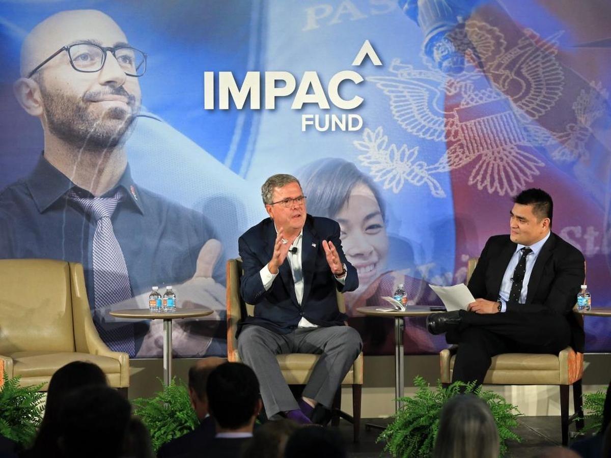 Former Florida Gov. Jeb Bush and Pulitzer Prize-winning journalist Jose Antonio Vargas speak to business and political leaders gathered at the University of Miami Newman Alumni Center on Tuesday, Nov. 28, 2017.