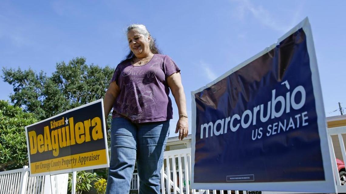 Diana Font, executive director of the Puerto Rican Chamber of Commerce and a Republican, stands outside her home in Orlando and talks about how she will vote for Hillary Clinton.