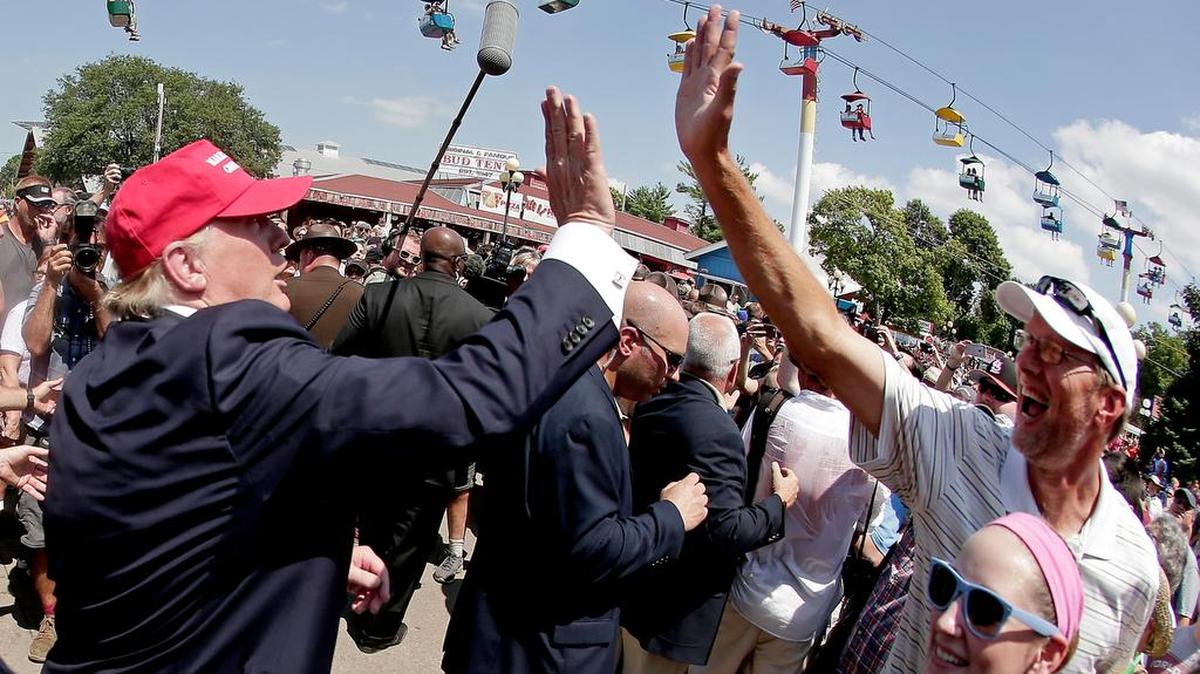 
Republican presidential candidate Donald Trump greets the crowd at the Iowa State Fair in Des Moines. Trump wants to deny citizenship to the babies of immigrants living in the U.S. illegally as part of an immigration plan that emphasizes border security and deportation for millions. 
