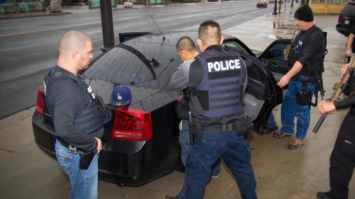 This Feb. 7, 2017, photo released by U.S. Immigration and Customs Enforcement shows foreign nationals being arrested during a targeted enforcement operation conducted by ICE aimed at immigration fugitives, re-entrants and at-large criminal aliens in Los Angeles.