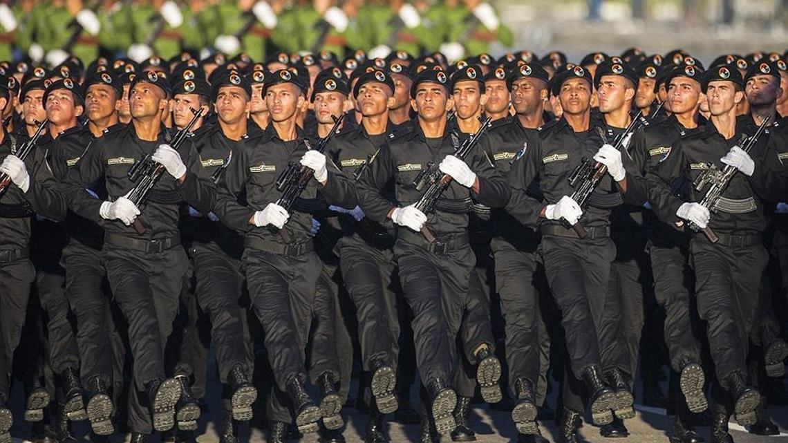 Special forces soldiers parade through Revolution Square in honor of late Cuban leader Fidel Castro on Monday