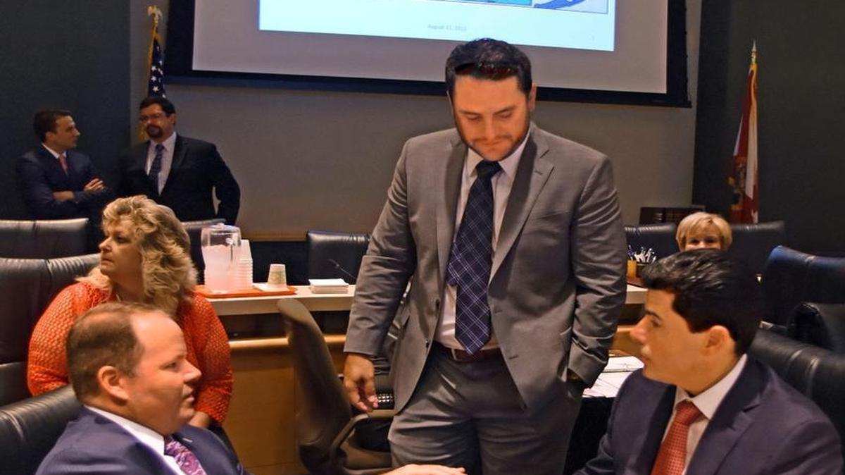 Rep. Carlos Trujillo, R-Doral, standing, and Rep. Jose R. Oliva, R-Miami Lakes, sitting at right.