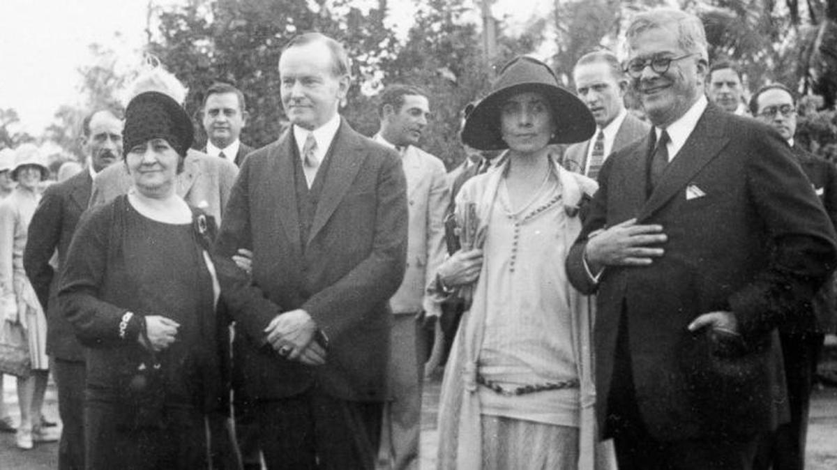 President Calvin Coolidge, center, during his visit to Cuba in 1928, with Cuban President Gerardo Machado, far right.