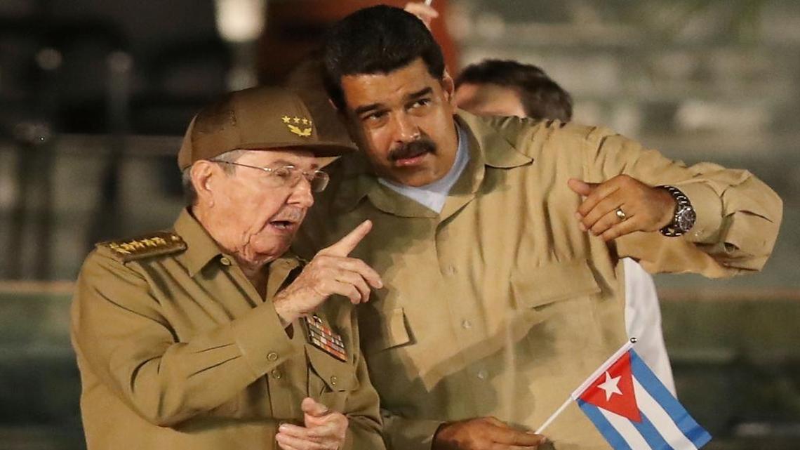 Cuban leader Raúl Castro speaks with Venezuela’s President Nicolás Maduro during a memorial tribute for his brother Fidel Castro at the Antonio Maceo Revolution Square before the elder Castro’s burial in December.