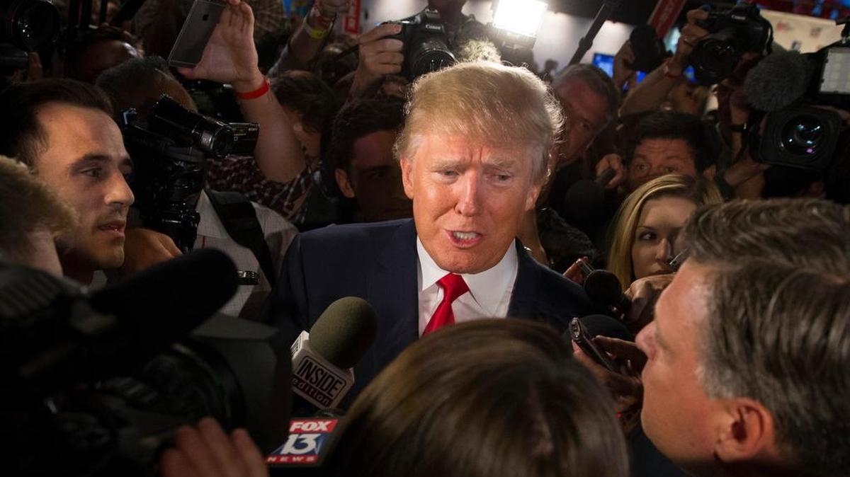 
Republican presidential candidate Donald Trump speaks to the media in the spin room after the first Republican presidential debate at the Quicken Loans Arena Thursday night in Cleveland. 
