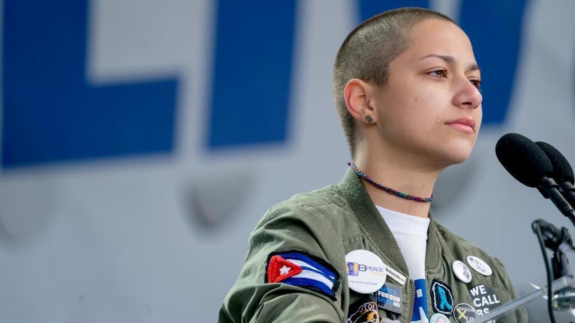 Emma Gonzalez, a survivor of the mass shooting at Marjory Stoneman Douglas High School in Parkland, Fla., closes her eyes and cries as she stands silently at the podium and times the amount of time it took the Parkland shooter to go on his killing spree during the "March for Our Lives" rally in support of gun control in Washington, Saturday, March 24, 2018.