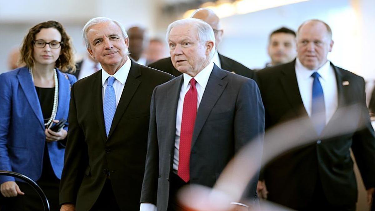 Miami Dade-County Mayor Carlos Gimenez, second from left, joined U.S. Attorney General Jeff Sessions and Immigration and Customs Enforcement Acting Director Thomas Homan as they arrived for a conference.