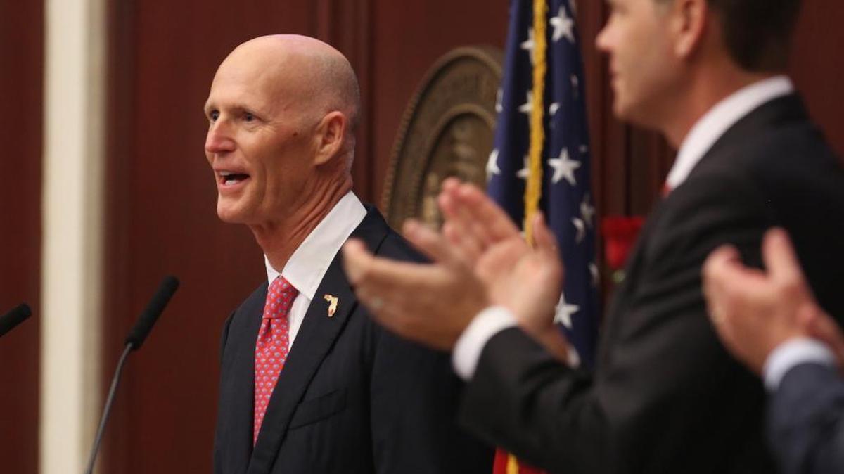 Florida Gov. Rick Scott reacts to the applause from members of the Florida Legislature as he gives his State of the State address in Tallahassee on Tuesday.
