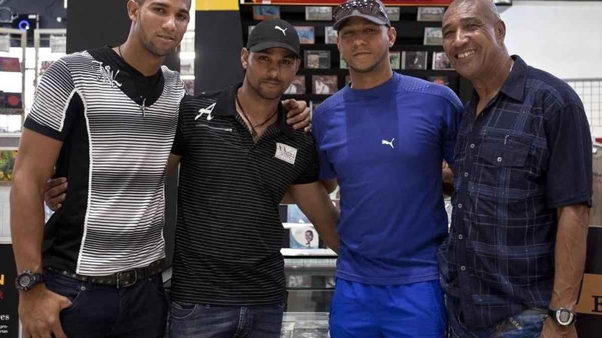 The prince of Cuban baseball, Yulieski Gourriel, (second from right) and brother Lourdes Gourriel Jr. (left) defect in Santo Domingo with Major League dreams. In this 2014 photo, father Lourdes Gourriel is at far right, and brother Yunieski Gourriel is second from left.