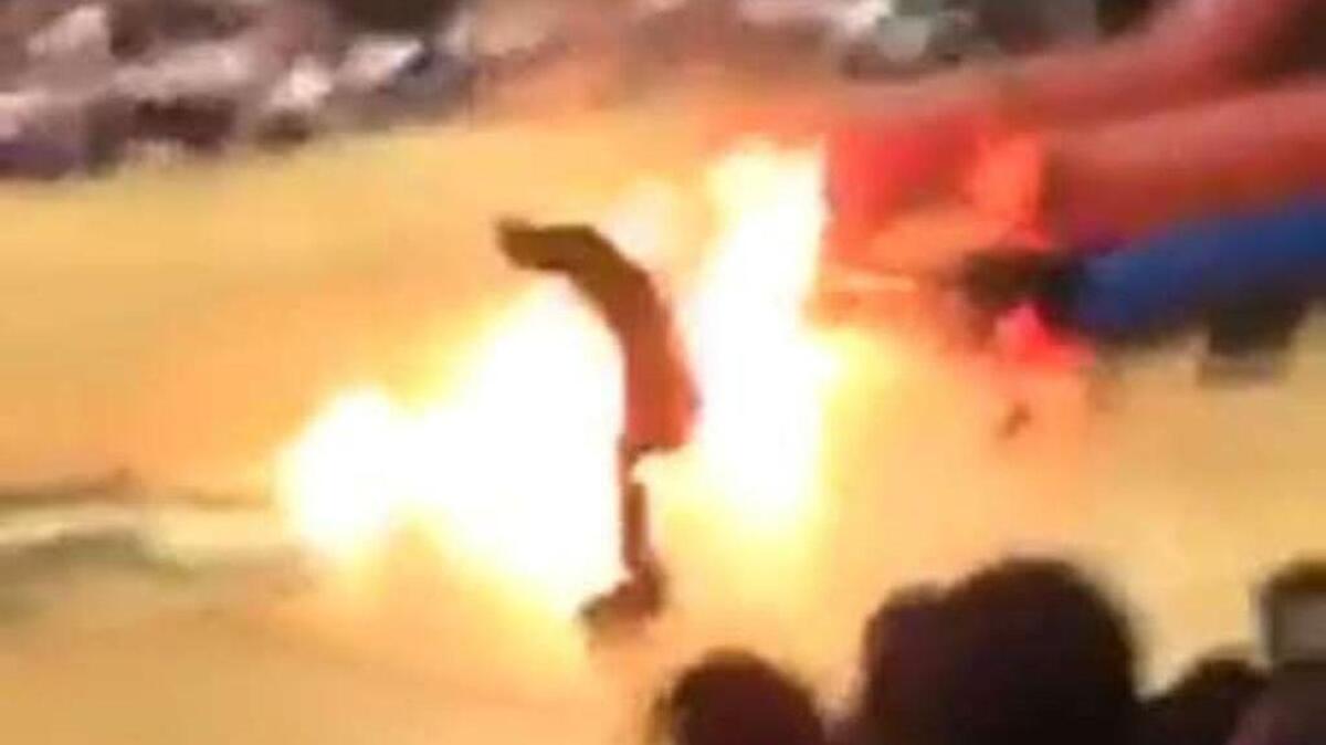 A performer at a Delray Beach Atlantic pep rally caught on fire Thursday.