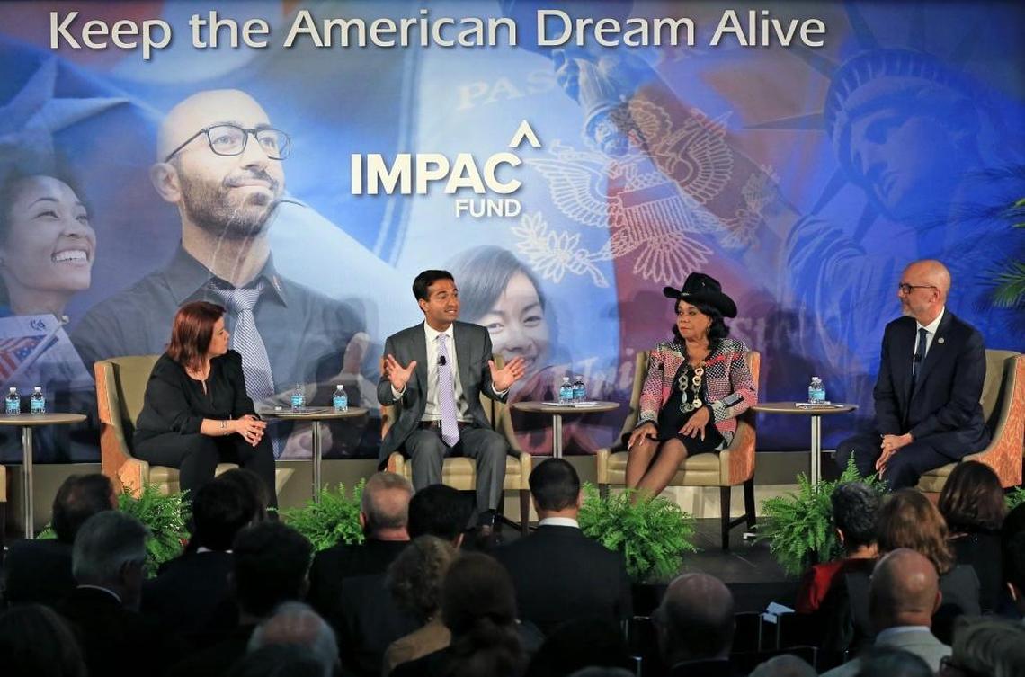 CNN’s Ana Navarro moderates a discussion with members of the South Florida Congressional delegation, from left, Republican Carlos Curbelo, and Democrats Frederica Wilson and Ted Deutch, during the IMPAC Fund Immigration Summit Agenda at the University of Miami Newman Alumni Center on Tuesday, Nov. 28, 2017.