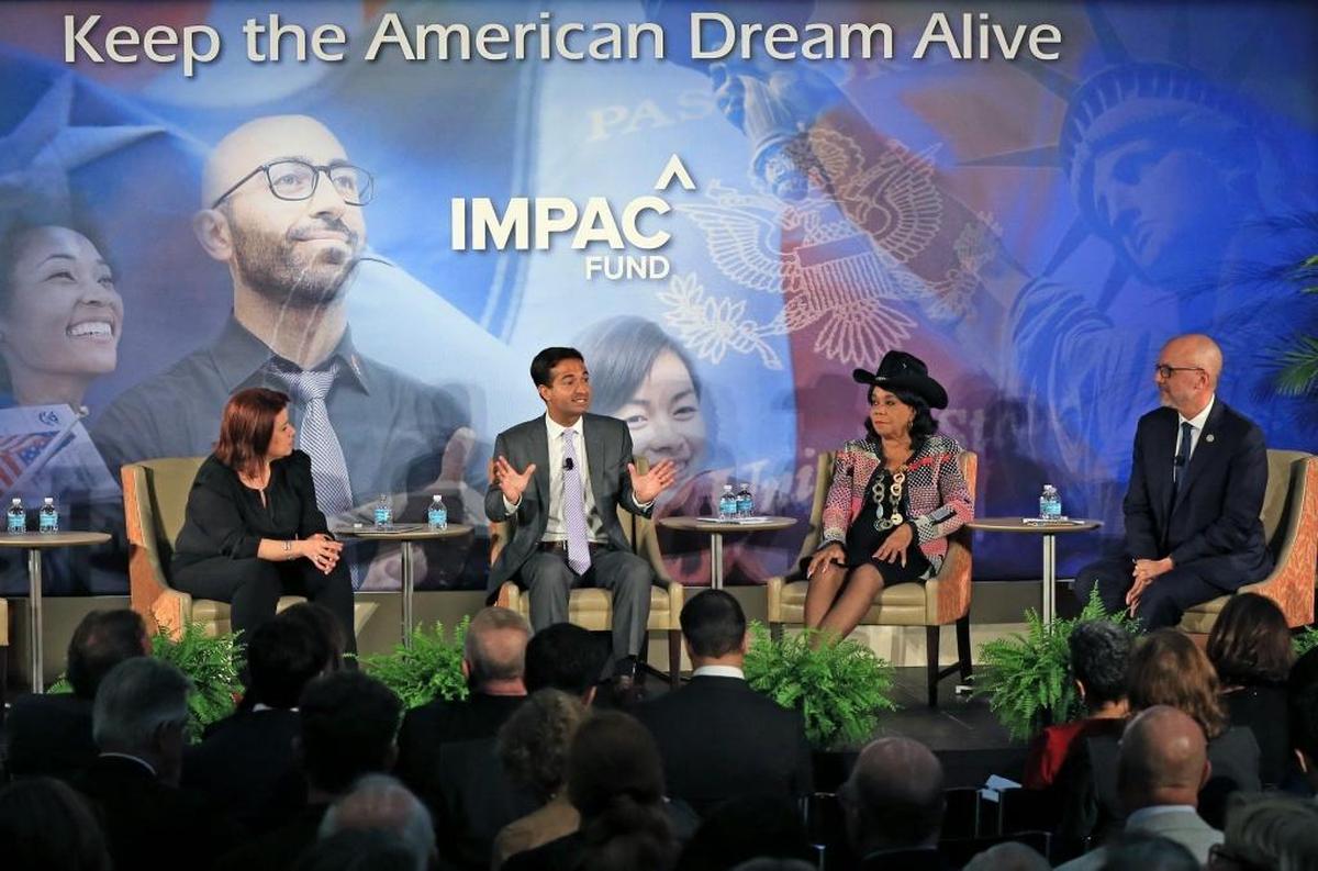 CNN’s Ana Navarro moderates a discussion with members of the South Florida Congressional delegation, from left, Republican Carlos Curbelo, and Democrats Frederica Wilson and Ted Deutch, during the IMPAC Fund Immigration Summit Agenda at the University of Miami Newman Alumni Center on Tuesday, Nov. 28, 2017.