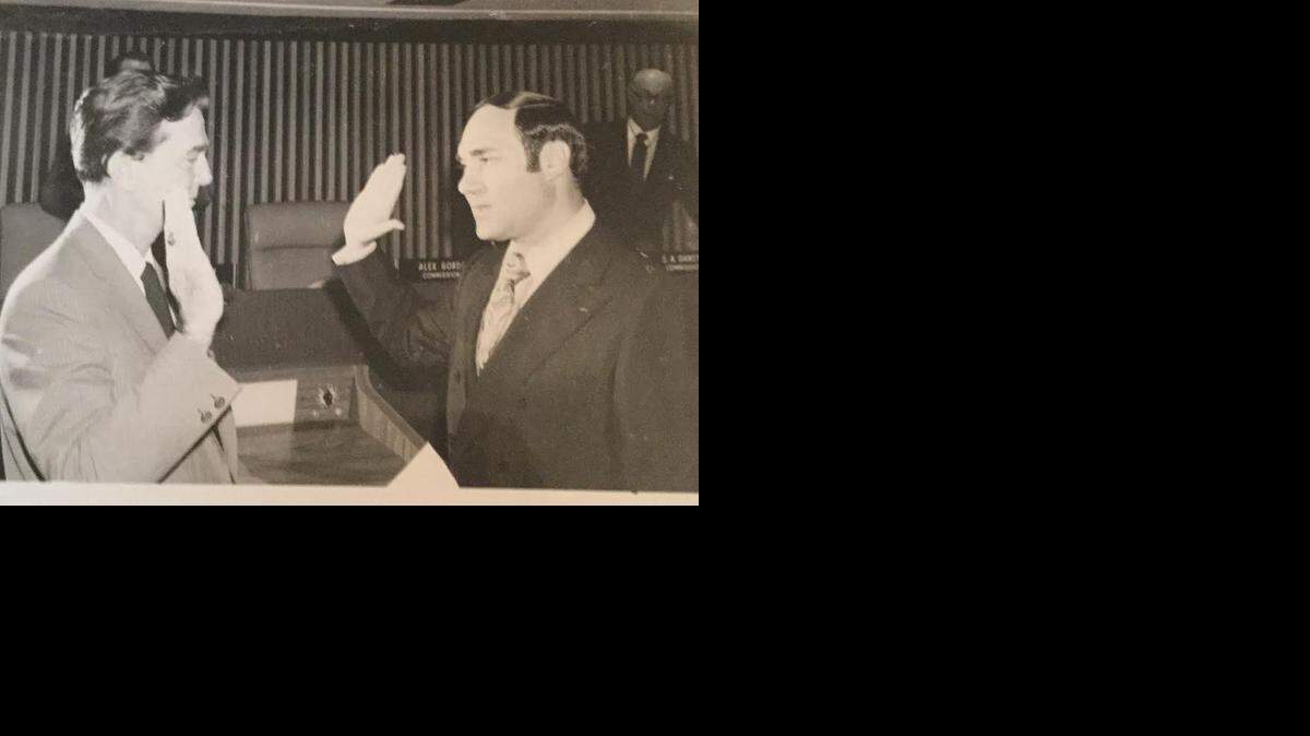 
SWEARING IN: Miami-Dade County Commissioner Harvey Reiseman (right), who served from 1971 to 1973, takes the oath of office in 1971 from Judge Francis Knuck (left). Reiseman was also a Miami municipal judge from 1967 to 1971.

