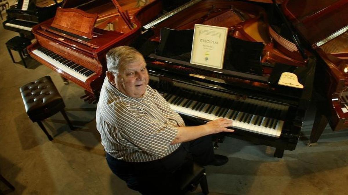 Victor Tibaldeo ran the family business Victor Pianos & Organs at 300 NW 54th Street in Miami for six decades. He was shown here on December 11, 2002 in the grand piano building.