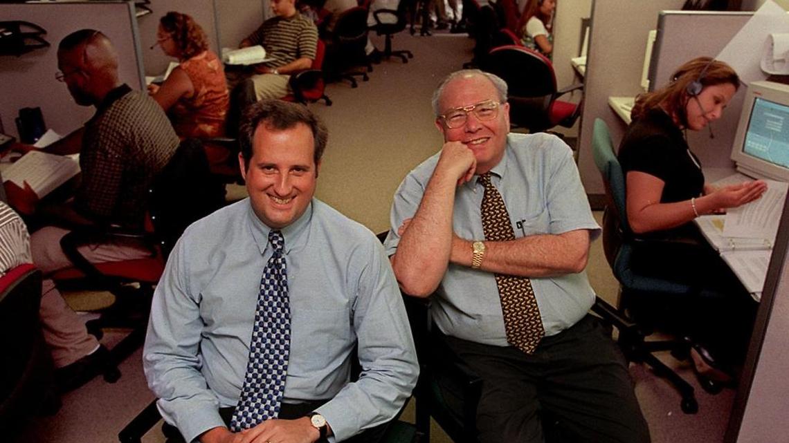 Pay-as-you-go wireless masterminds F.J. Pollak, president and CEO (left) and David Topp, chairman, are pictured together at the West Miami-Dade office of Topp Telecom, Inc. in June 1998. The company developed TracFone, now a subsidiary of América Móvil, and currently one of the country’s top wireless providers.
