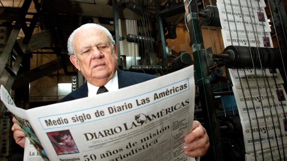 Horacio Aguirre founded Diario Las Américas with his brother on July 4, 1953, in Miami. He is seen here with his newspaper one day before its 50th anniversary on July 3, 2003.