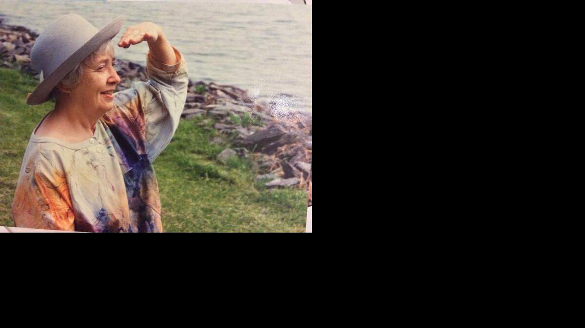 
STYLISH WARDROBE: Joyce Lux, in one of her own designs, overlooks Biscayne Bay
