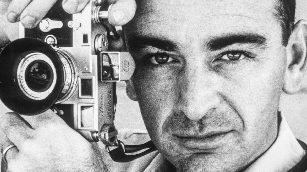 Fred Ward, the photographer who shot major world figures like JFK, Castro and the Beatles, is captured at his lens in his college years at the University of Florida in the late 1950s by his wife Charlotte Ward.