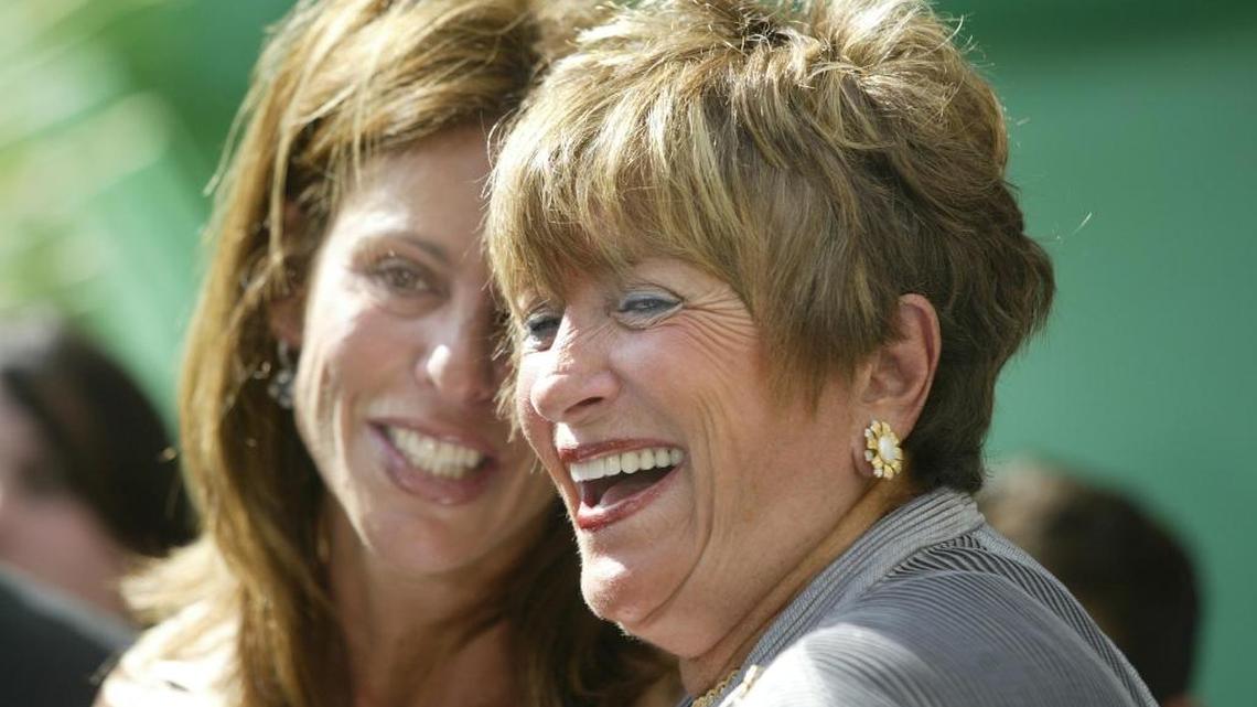 Sue Miller (right) shared a laugh in Dec. 2004 with her daughter Leslie Miller Saiontz, at the announcement ceremony that Miller would be donating $100 million dollars to the University of Miami School of Medicine in honor of her late husband, Leonard Miller of Lennar Corp. fame.