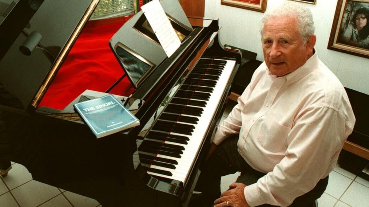 Cantor David Conviser served Temple Beth Sholom and Temple Emanu-El as music director, sang with the Robert Shaw Chorale around the country and performed with some of the 20th Century’s top artists. In 1998, pictured at his Miami Beach home, he wrote a book about Jewish music in the 1950's.