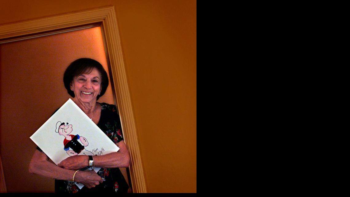 
ARTIST: Jean Karaty worked as an opaquer for Miami's Fleischer Studios from 1938 to 1943, the studio that produced Popeye, Betty Boop and Superman cartoons. She is seen at her home in the Roads in this July 2003 photo.
