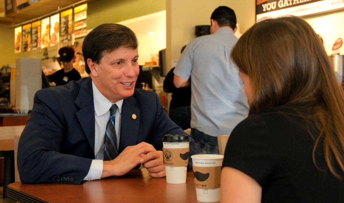 In this April 2015 file photo, Coral Gables’ then-vice mayor Bill Kerdyk Jr. chatted with Coral Gables Community Foundation executive director Mary Snow at Einstein Bros. Bagels on Miracle Mile. For years, Kerdyk had breakfast with his mom, Marlene Kerdyk, at this favorite spot. “She offered sage advice…she was such a positive person,” he said.