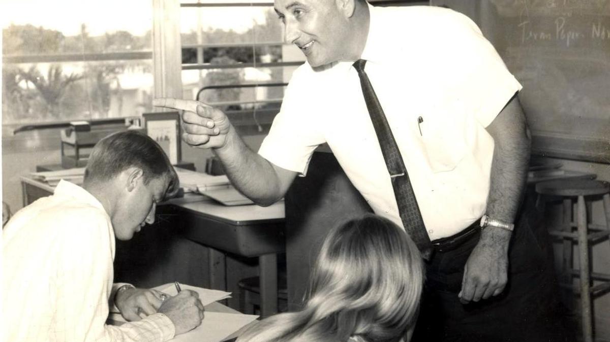 Daniel Krysa makes a point to his students at Miami Norland Senior High School early in his tenure there where he taught social studies, economics and history. Krysa joined Norland in its inaugural year in 1958 and stayed until his retirement in 1984.