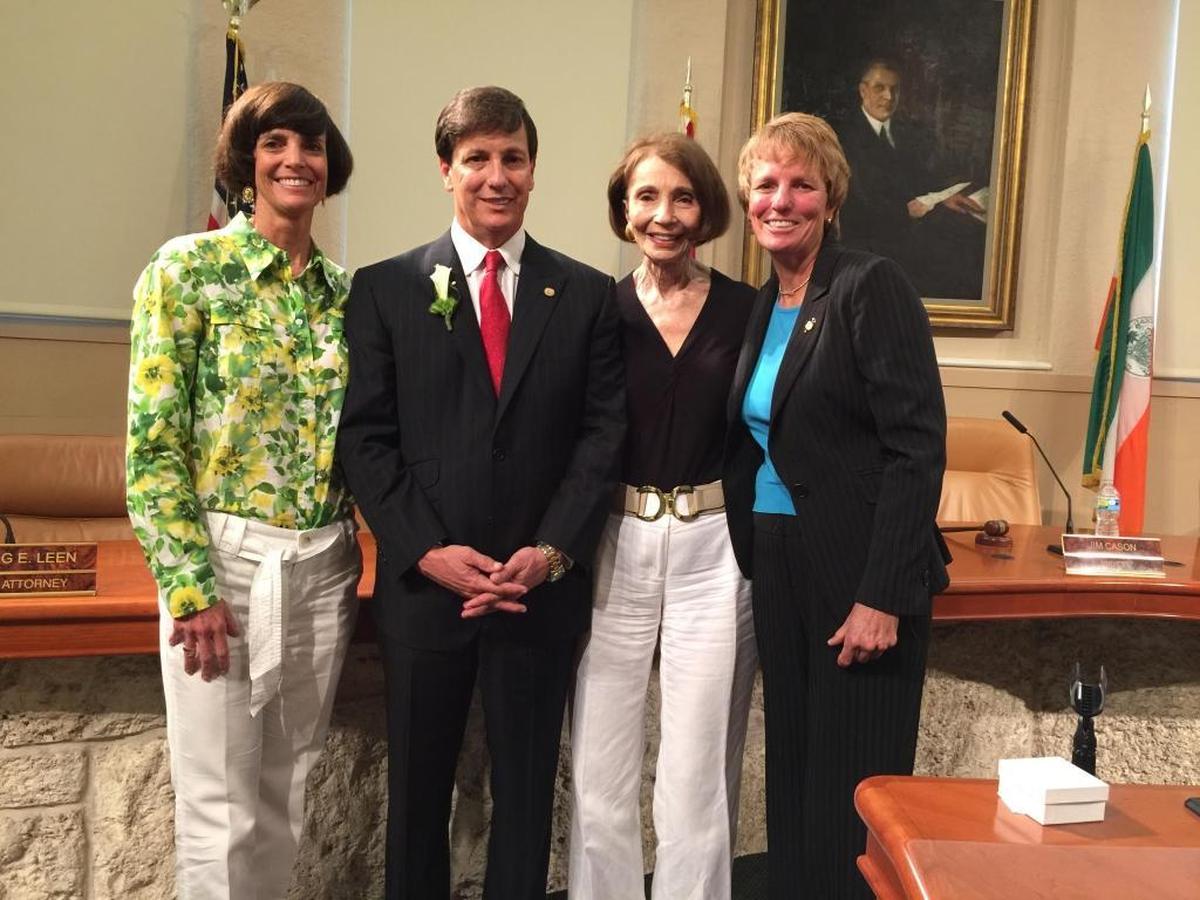 The Kerdyk family shares a last post inside City Hall. Son William Kerdyk Jr. (center) was termed out after serving on the commission for 20 years. The Kerdyks had had a member of the family on that desk since 1957. Joining Kerdyk are sisters Kim (left) and Tracy (right) and the family matriarch, Marlene Kerdyk (2nd from right).