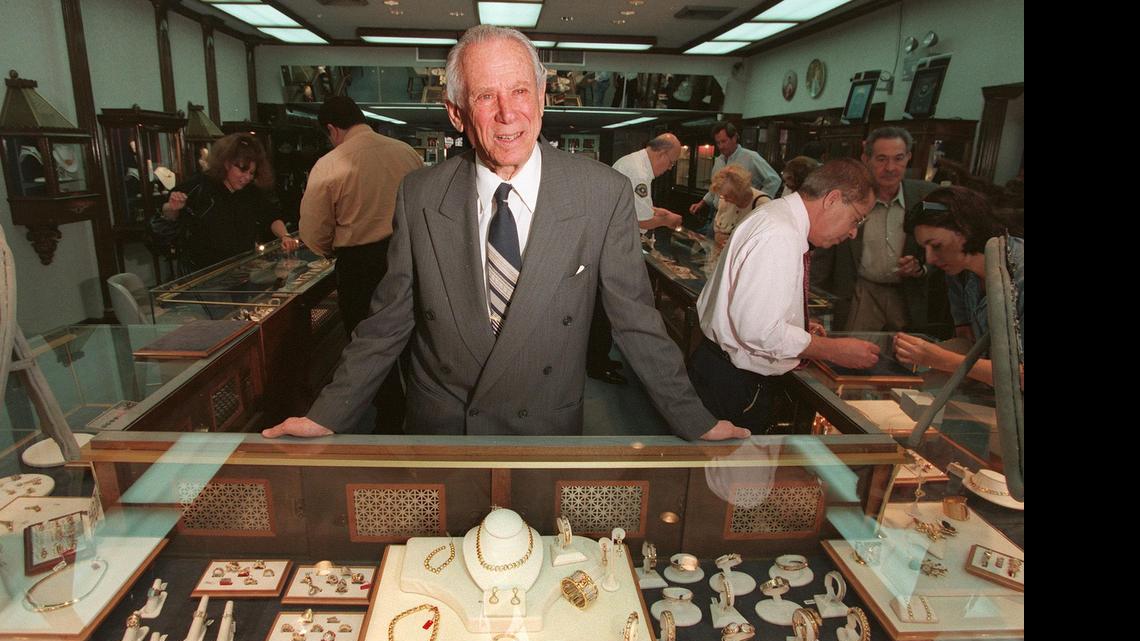 
SURROUNDED BY BEAUTY: David Balogh, in December 1998 at the flagship Balogh Jewelers store he opened with late wife Sallie, on Miami Beach’s 41st Street after World War II. Balogh Jewelers, which included branches in Coral Gables, Hallandale Beach and New York, catered to a knowledgeable clientele that included celebrities and royalty for more than 50 years.
