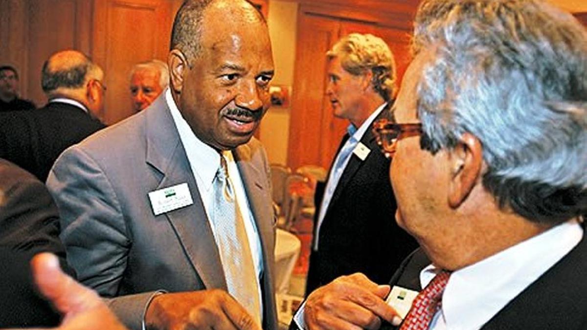 Robert Blake (left), general counsel, vice president and secretary of the University of Miami’s Board of Trustees, handled the school’s most challenging legal affairs from 1994 to his retirement in 2006.