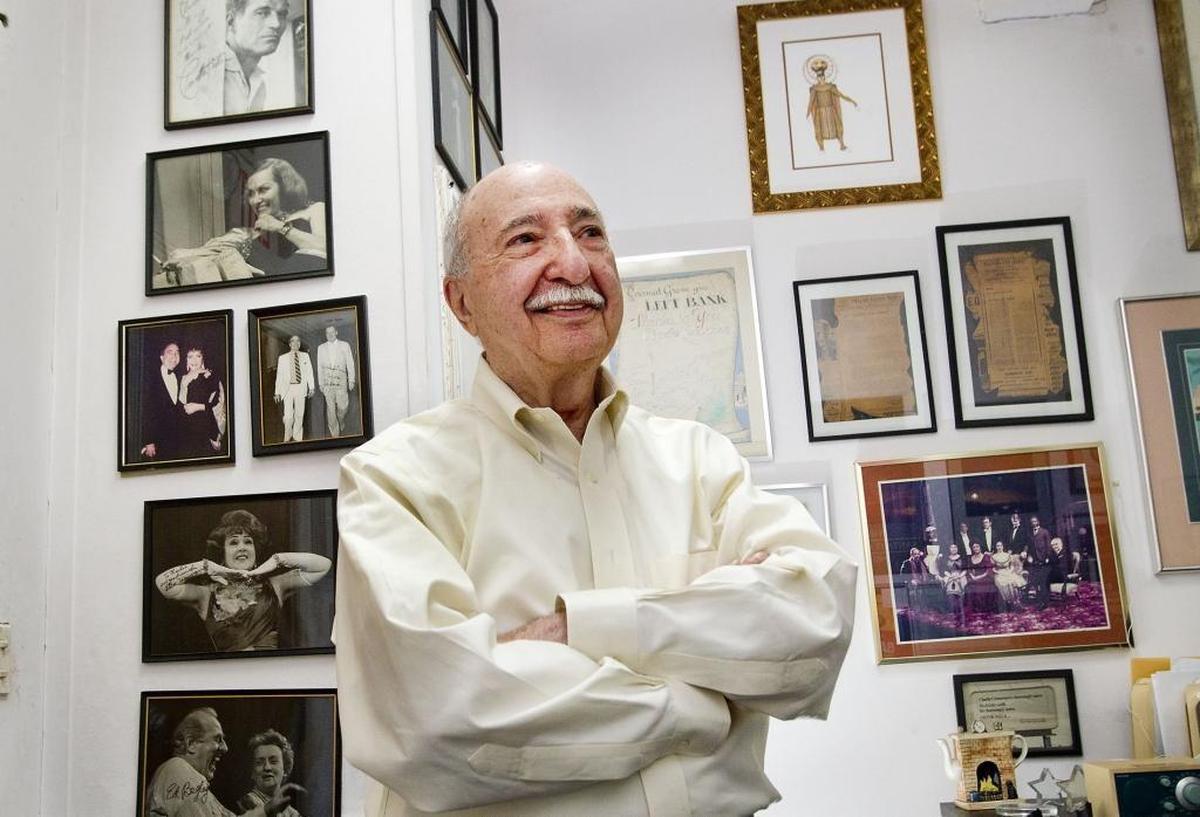 Charlie Cinnamon, founder of the Coconut Grove Arts Festival, had framed memories of the early days of the festival on the walls in his former Lincoln Road office. The beloved press agent, who died in 2016, is seen here on Feb. 11, 2013.